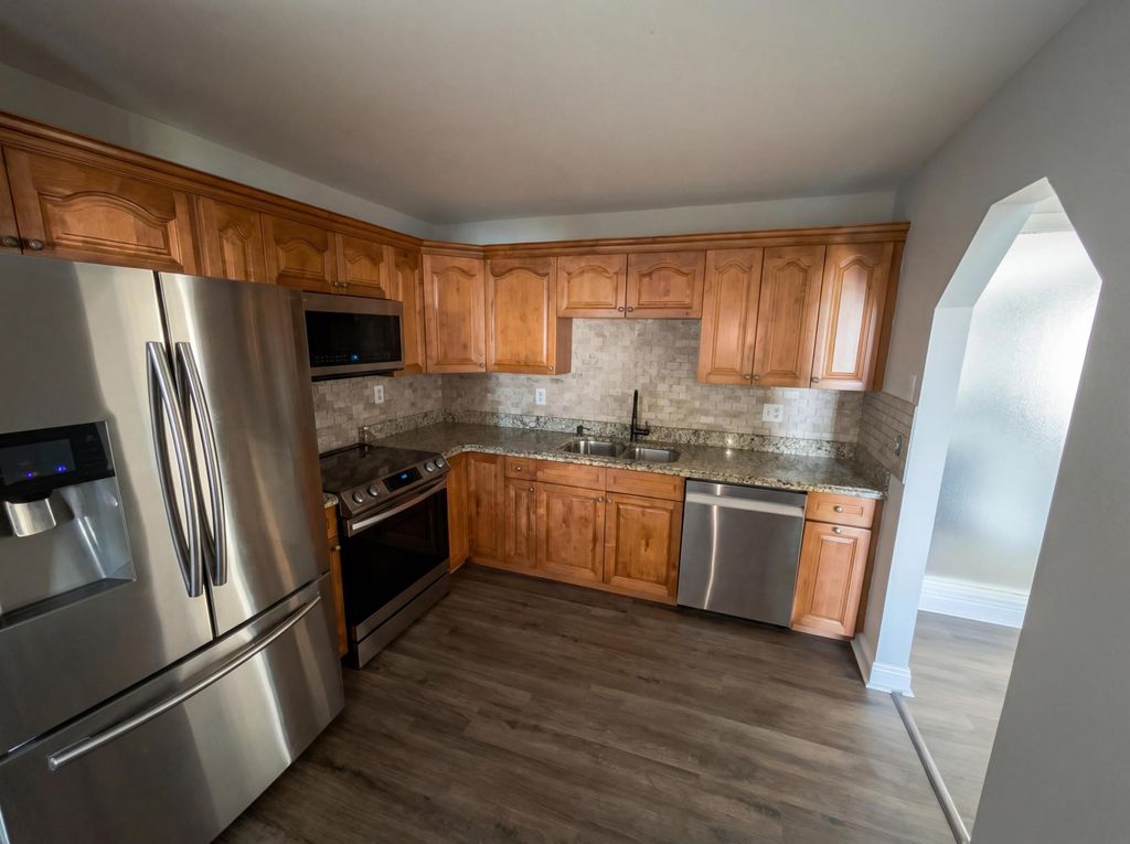 Photo of 1930 NE 23rd Terrace, Jensen Beach, FL 34957 (MLS # B26007443)