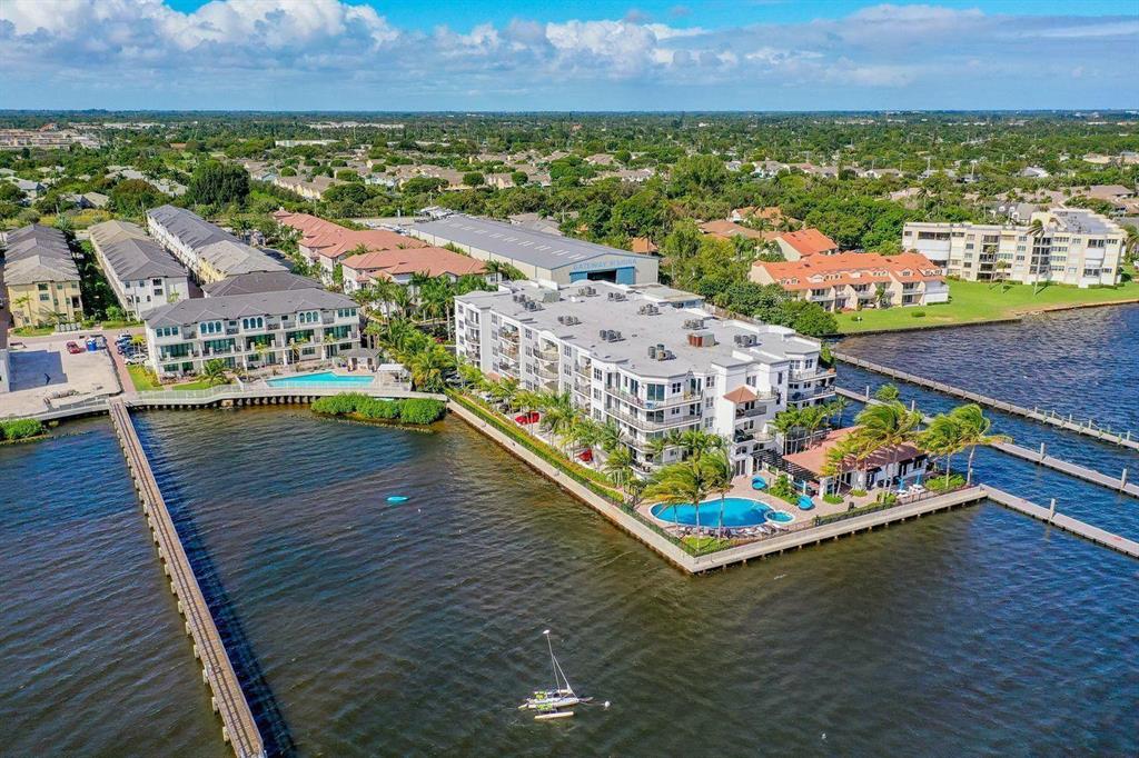 Boutique Island feeling on the Intra Coastal. Must see! Ideal location in the gated community of Peninsula on the Intracoastal. Minutes from downtown Delray Beach and West Palm. Beautiful 2 story townhome with ideal fenced in back patio area great for entertaining. This home features 3 bedrooms, 2.5 bathrooms and a 2 car garage. Upstairs you will find a spacious Master Bedroom with his/her walk in closets. High ceilings upstairs.Master bathroom features dual sinks, walk in shower, bidet. Walk down the hall to your 2 additional bedrooms that share a bathroom. Convert one room into your at home office. Great amenities incl.: Fitness Center, Clubhouse, Htd Pool & Jacuzzi. Boater's come enjoy the convenience of the neighboring Marina.