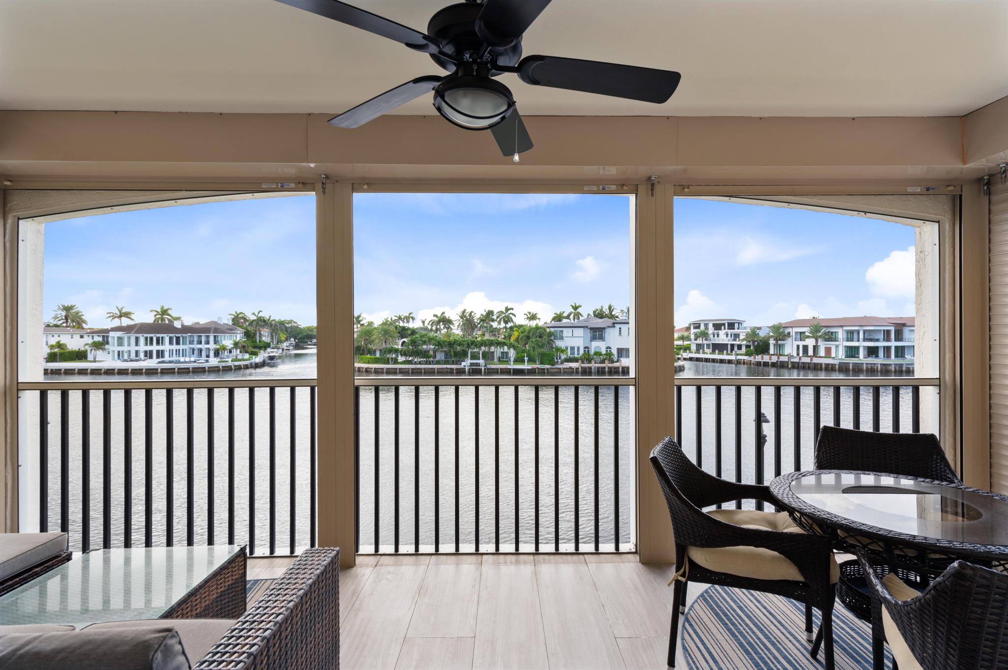 WOW! - Talk about a view! This impressive 2BR 2BA apartment is newly renovated, and located DIRECTLY on the intracoastal. Available for Seasonal Lease (90 days minimum) November 2025 - April 2026. Enjoy a screened in balcony perfect for entertaining friends and family, or watching the many yachts cruise by. This spacious apartment features tile wood floors through-out, open concept kitchen, and washer and dryer in the unit. San Remo is a highly desirable condominium community with many amenities, including clubhouse, private resort style pool, beach access, covered parking, and marina.