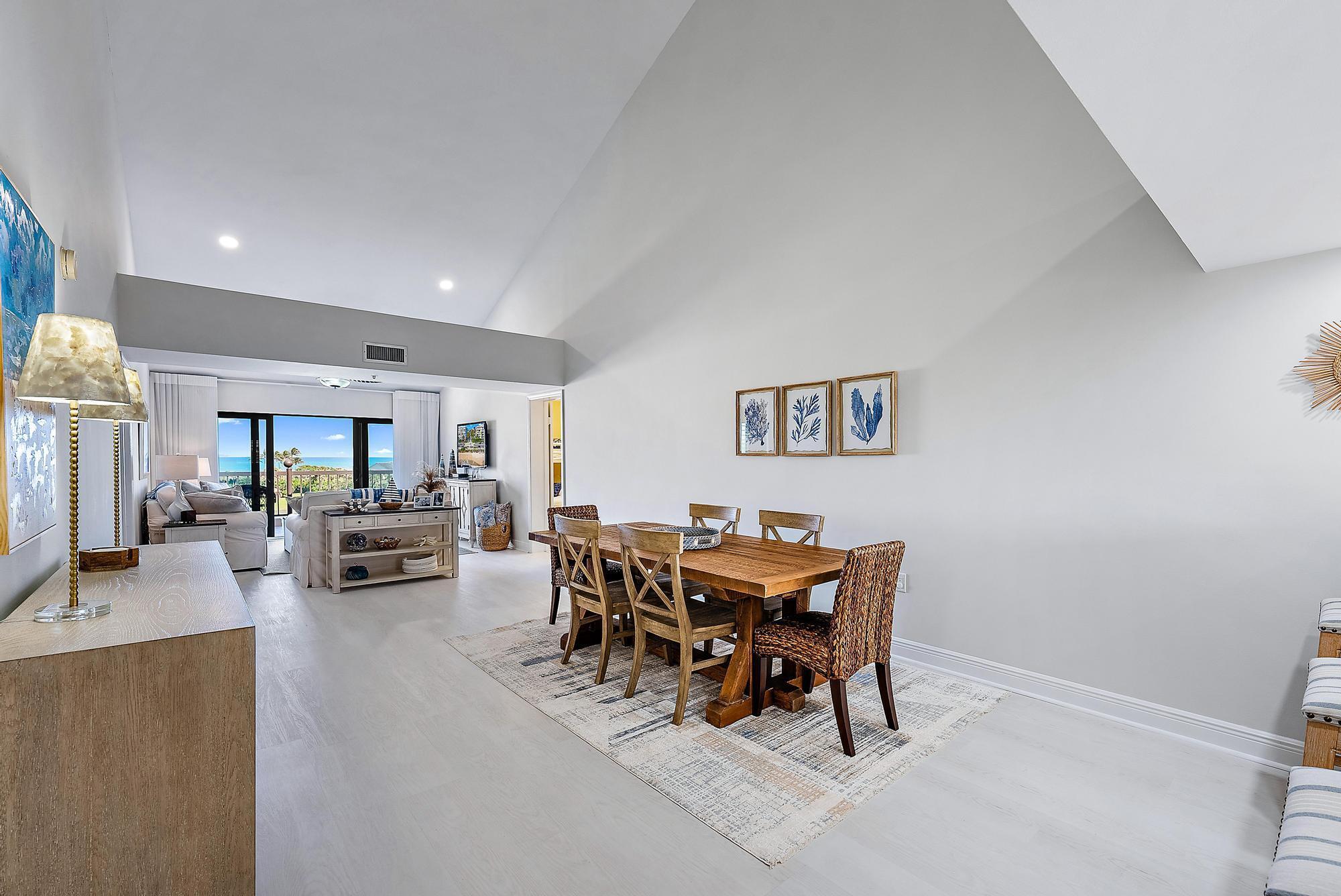 Breathe in the sparkling, Bahama-blue, ocean views from this stunning penthouse with soaring, 20 foot cathedral ceilings. The open floor plan allows for an expansive living and dining flow that opens to a private balcony where you can watch the sunrise every morning. This gorgeous property has been thoughtfully updated for the most discerning taste. Turnkey is an understatement. There are 2 bedrooms as well as a separate area that is commonly used for additional sleeping quarters. Ocean Bluffs North is a private, ocean-side, gated community with tennis courts and a resort style pool. Jupiter is known for its beautiful beaches, pier, iconic lighthouse, 5 start dining, and world-class golf. Schedule your showing today!
