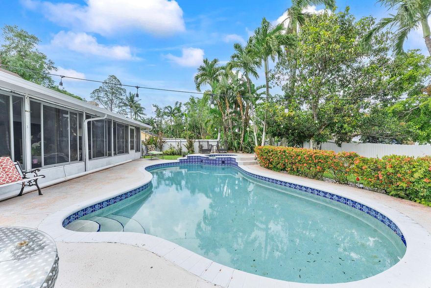 WATERFRONT - POOL - CORNER LOT - IN-LAW SUITE - LAKE DECK- NO HOA This UNIQUE PROPERTY has it all and offers the perfect blend of comfort, versatility, and location, ideal as an AIRBNB INVESTMENT or a FAMILY DREAM HOME. Located in the heart of DESIRED PEMBROKE PINES, in a QUIET, FAMILY-FRIENDLY NEIGHBORHOOD, just minutes from main avenues, the FLORIDA TURNPIKE, top-rated SCHOOLS, STORES, RESTAURANTS, and more. This 4 BEDROOM / 3 BATHROOM home sits on a spacious CORNER LOT with MATURE LANDSCAPING and features an OPEN FLOOR PLAN, TILE FLOORING THROUGHOUT, a MODERN KITCHEN WITH STAINLESS STEEL APPLIANCES, and UPDATED BATHROOMS. Enjoy LAKE VIEWS FROM YOUR ENCLOSED PATIO, unwind on your PRIVATE LAKE DECK, and host guests by the SPARKLING POOL and CUSTOM OUTDOOR BBQ COUNTER.