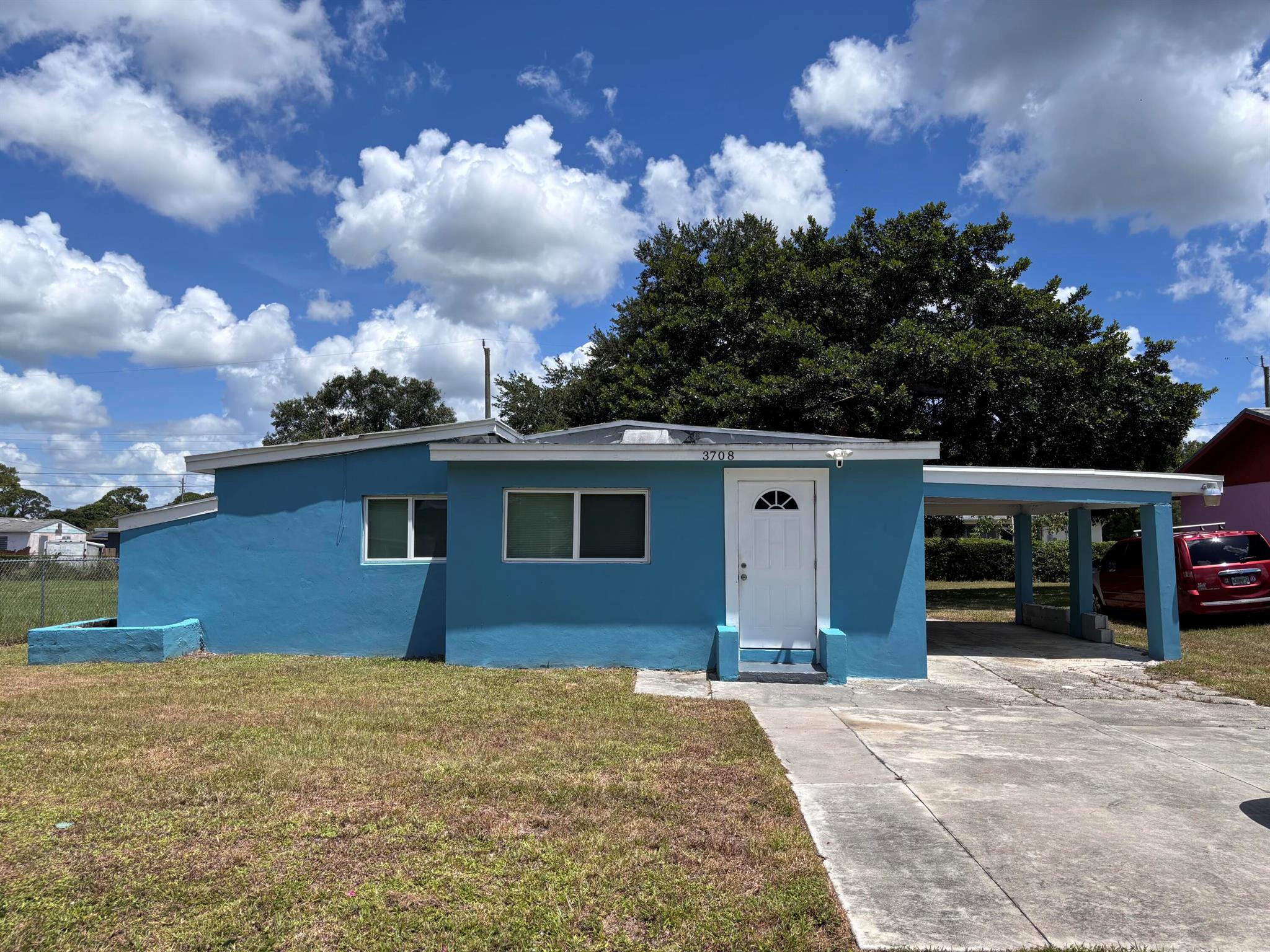 This property with it's large backyard is centrally located and has been completely renovated; including brand new kitchen, upgraded bathroom with new vanity and floor to ceiling tiled shower, new wood laminate flooring throughout, new light fixtures, impact windows, new A/C February 2023, painted inside and out.