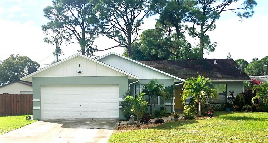 Photo of 3126 SW Nutley Street, Port Saint Lucie, FL 34953 (MLS # R10758238)