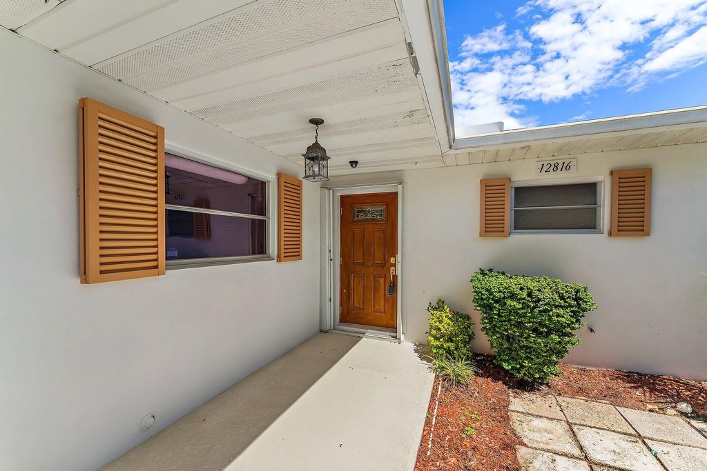 Photo of 12816 Prosperity Farms Road, Palm Beach Gardens, FL 33410 (MLS # R10921718)