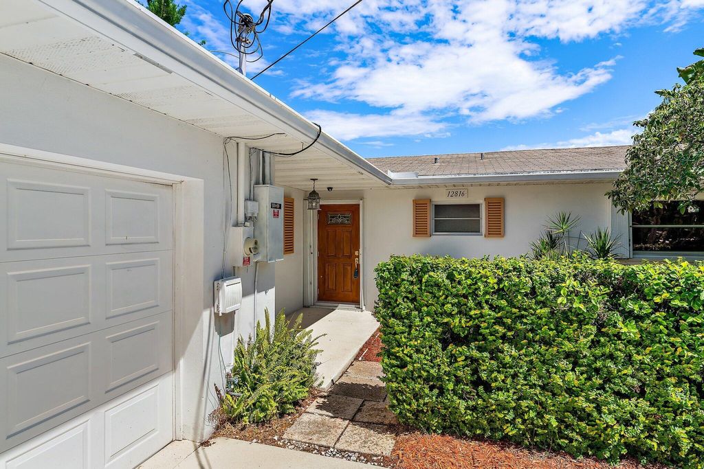 Photo of 12816 Prosperity Farms Road, Palm Beach Gardens, FL 33410 (MLS # R10921718)