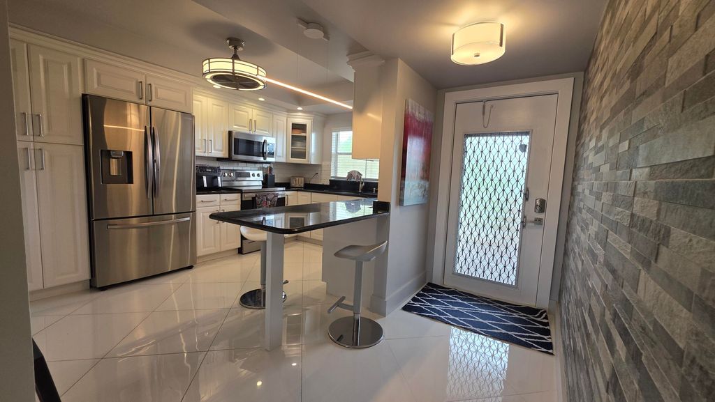 Photo of 9301 Sunrise Lakes Boulevard #306, Sunrise, FL 33322 (MLS # B26030144)