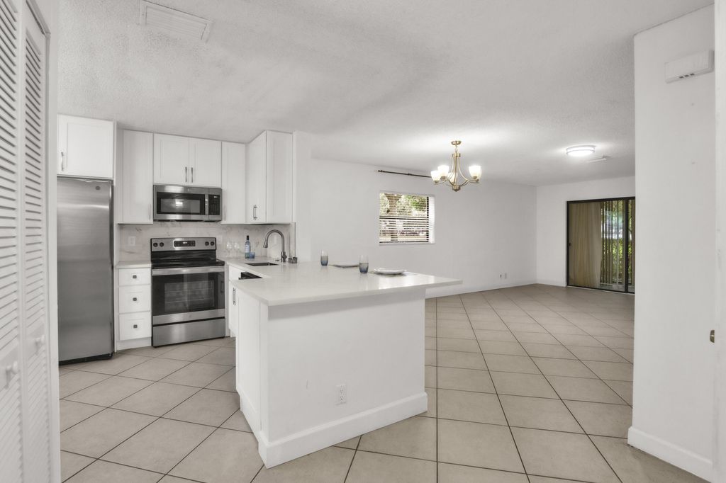 Photo of 2112 NW 45th Avenue, Coconut Creek, FL 33066 (MLS # B26039430)