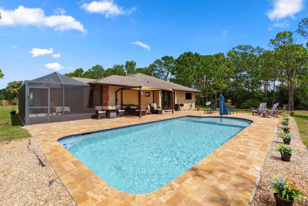 Photo of 13759 159th Street N, Jupiter, FL 33478 (MLS # R10997661)