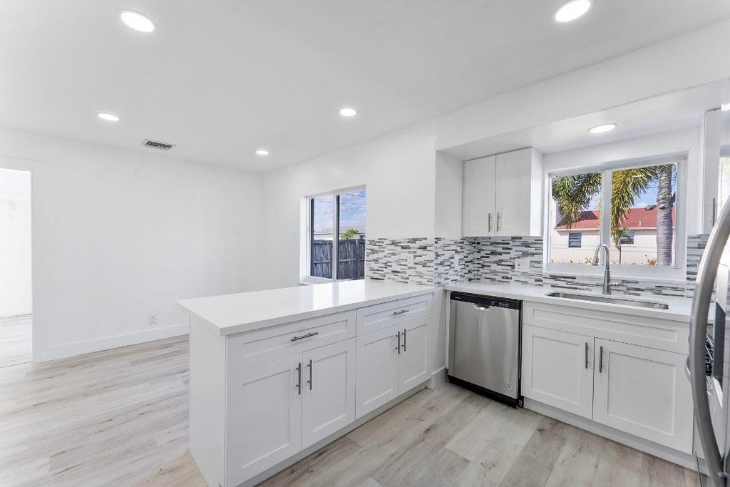 Photo of 240 NW 5th Street, Deerfield Beach, FL 33441 (MLS # R11107245)