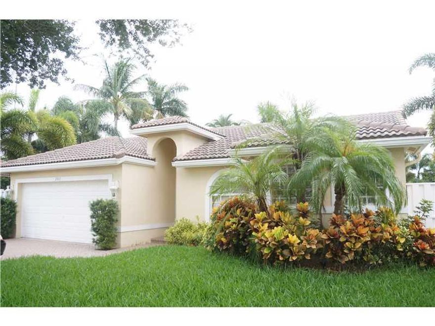 This is it!  Swimming pool with built in spa? Check! HUGE private backyard? Got it! Hard to find newer construction? Yep! 2 car garage? Of course! Cathedral ceiling in the living room? You know the answer! Perfect for entertaining or enjoying the south Fl orida lifestyle. Split bedroom floorplan, tile roof, walk in closets, laundry room, convenient location near I-95.  Small enclave of homes built in the late 90's with features that are hard to find in this price range. Hurry!  This will go fast!