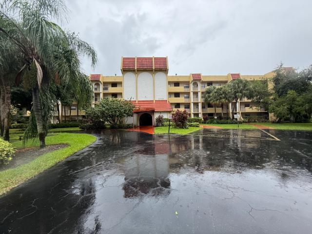 Photo of 23345 CAROLWOOD Lane #405, Boca Raton, FL 33428 (MLS # B26089987)