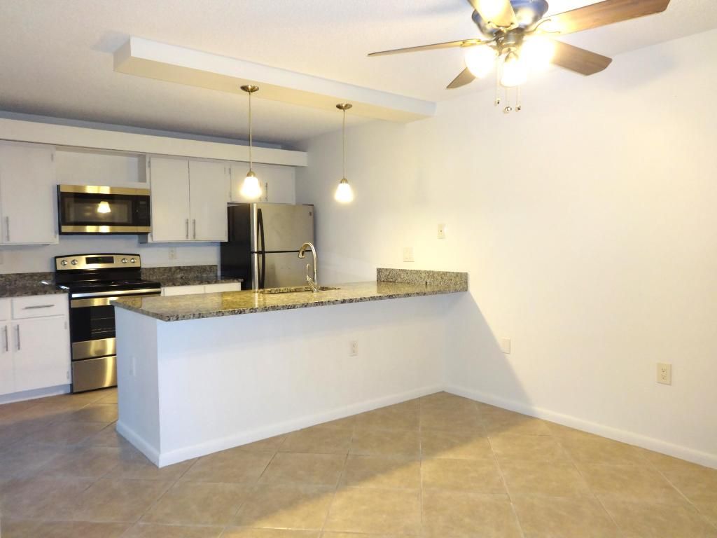 Photo of 3233 32nd Court, Jupiter, FL 33477 (MLS # R10929949)