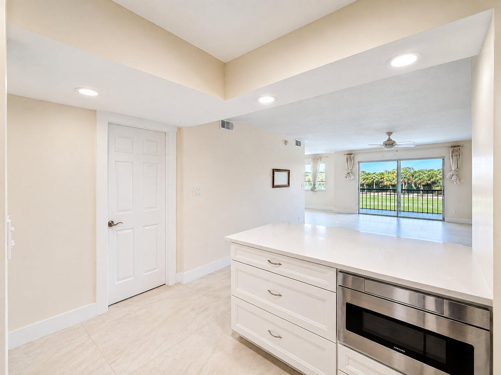Photo of 9411 N Hollybrook Lake Drive #310, Pembroke Pines, FL 33025 (MLS # B26069114)