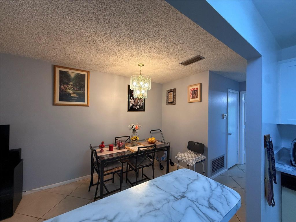 Photo of 10 Lake Vista Trail #204, Port Saint Lucie, FL 34952 (MLS # F10509299)