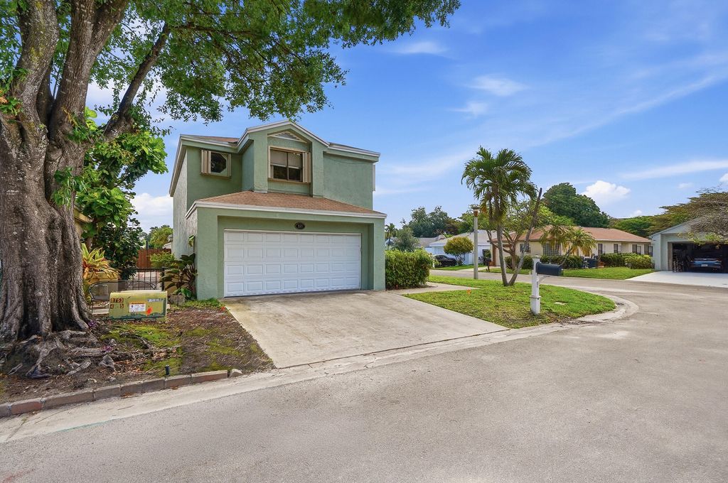 Photo of 3321 NW 22nd Court, Coconut Creek, FL 33066 (MLS # B26026099)