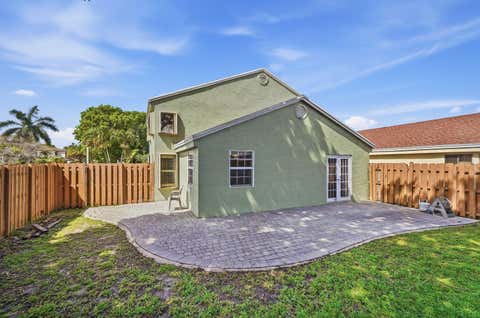 Tiny photo for 3321 NW 22nd Court, Coconut Creek, FL 33066 (MLS # B26026099)