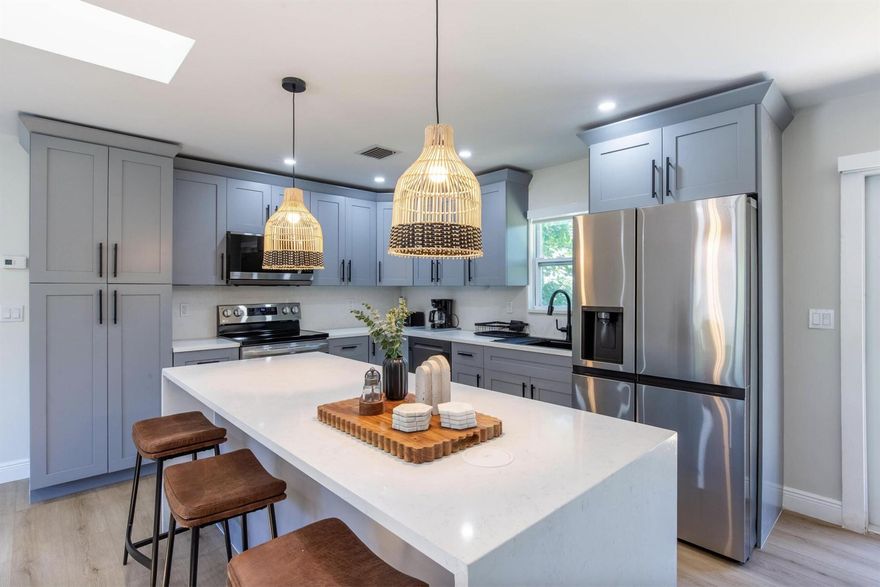 Welcome to this beautifully remodeled three-bedroom, two-bath rental home set on a spacious 1.20-acre lot. Recently updated with a 2024 roof, a modern kitchen featuring quartz countertops and top-of-the-line appliances, stylish bathrooms, new tile flooring, and fresh paint throughout, this home offers both comfort and style. Enjoy the convenience of a new washer and dryer, air conditioning unit, and water heater. The large lot provides plenty of room for outdoor activities, giving you the space and privacy rarely found in a rental property.