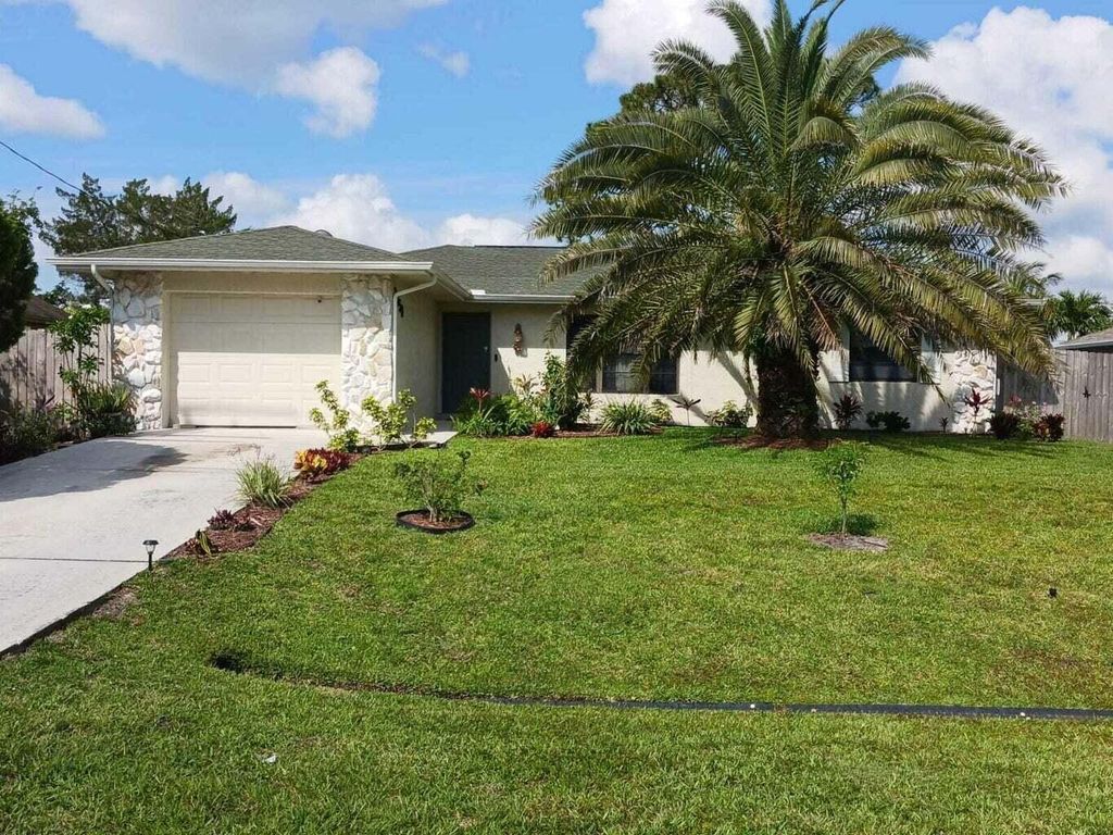 Photo of 2450 SW Bayshore Boulevard, Port Saint Lucie, FL 34984 (MLS # R10983149)