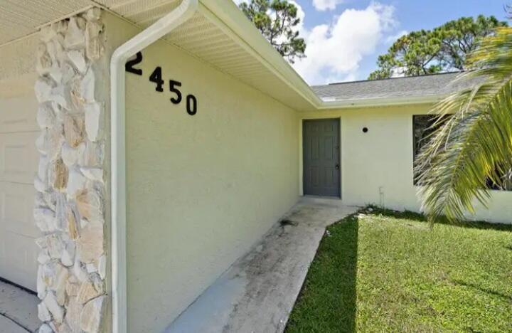 Photo of 2450 SW Bayshore Boulevard, Port Saint Lucie, FL 34984 (MLS # R10983149)