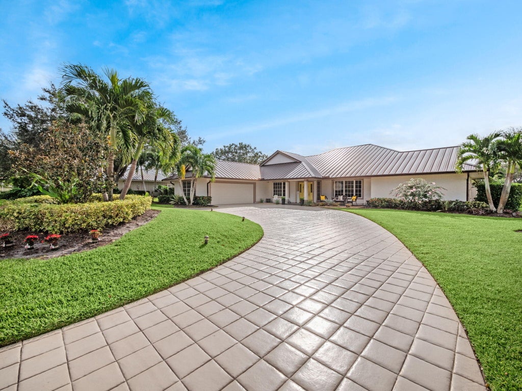 Photo of 6346 SE Oakmont Place, Stuart, FL 34997 (MLS # R11033368)