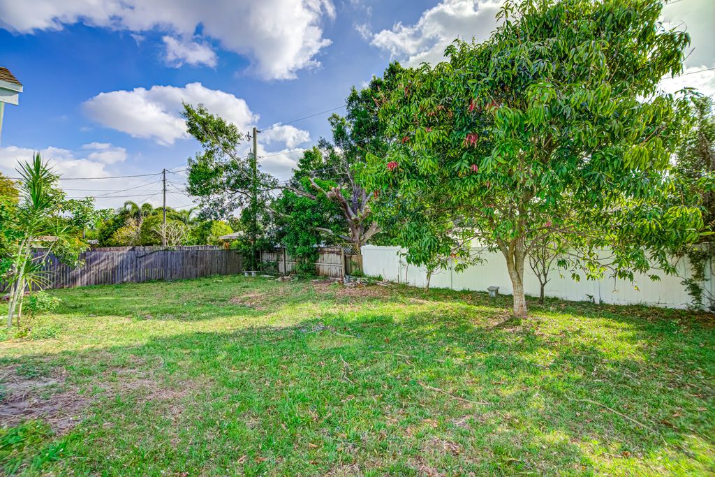 Photo of 2361 SW Freeman Street, Port Saint Lucie, FL 34953 (MLS # R10790186)