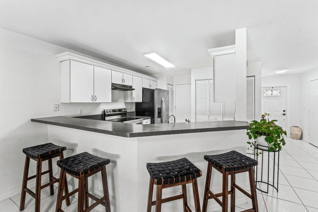 Photo of 114 Wooden Mill Terrace, Jupiter, FL 33458 (MLS # B26084833)