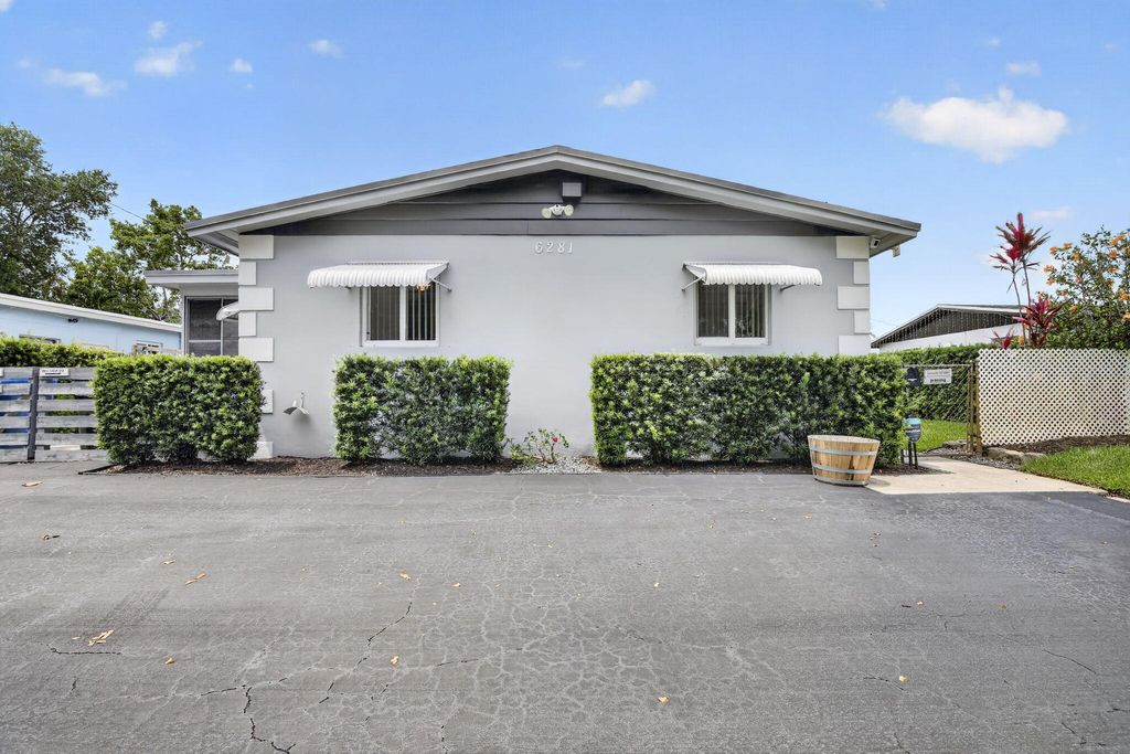 Photo of 6281 Moseley Street #1-2, Hollywood, FL 33024 (MLS # B26027906)