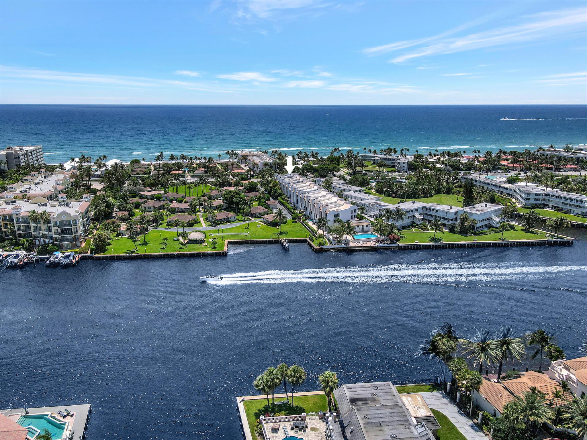 This Gorgeous Townhome is located between the ocean and Intracoastal on the North end of Hillsboro Mile, so it is just a short walk to all the shops, restaurants and bars of the Deerfield Beach curve. Features 3 bd/3.5 Baths and has a private elevator to access all levels. The Beautiful open kitchen includes granite counter tops and the dining area features a vaulted ceiling & skylight. Master Suite has fireplace, en-suite bath, walk-in closet and balcony. Spacious 2nd bedroom also has en-suite bath & balcony. Ground level 3rd bed/ fam room accesses the private outdoor patio, 2car/tandem garage, community pool & day dock on Intracoastal, Private Beach access across the street and Pet friendly (up to 40 lbs and 2 allowed) and New roof and skylight! Come live the Beach Lifestyle!