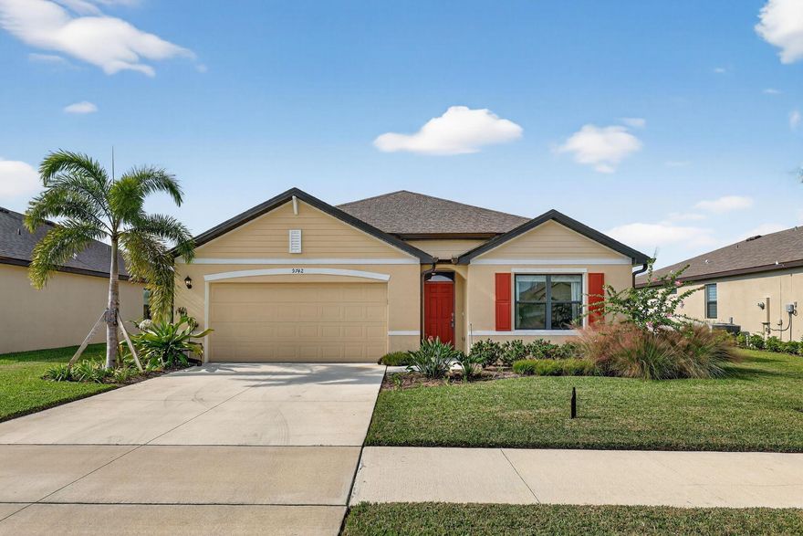 PORT SAINT LUCIE!! Stunning 2024 single-story 4BR/2BA home in sought-after Crosstown Commons. This modern home features an open-concept layout, spacious living areas, and a stylish kitchen with stainless steel appliances, large island, and walk-in pantry. Tile floors in main areas and cozy carpet in bedrooms. The primary suite includes dual sinks and walk-in closets. Relax or entertain on the covered patio overlooking a peaceful lake. Community offers resort-style amenities--clubhouse, pool, splash zone, pickleball, tennis, playground, and sidewalks. Low HOA only $43.55. Prime location near I-95, US-1, Tradition, and St. Lucie West. Furniture negotiable.