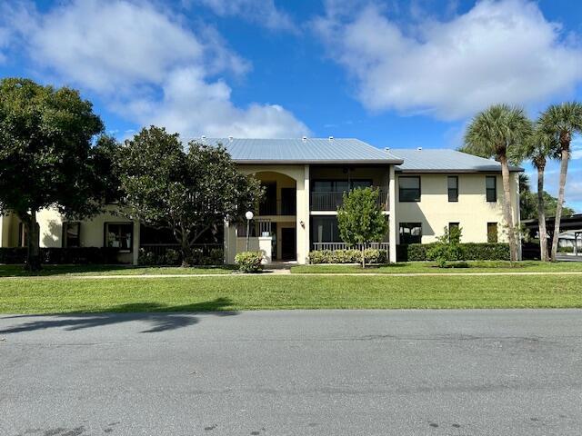 Move in Now! Spacious 2 bedroom/2 full bathrooms. 1300 sq. ft. open concept 2nd floor condo. Large primary bedroom with 1 walk in closet and 1 reach in closet. , Each bathroom includes its own linen closet, kitchen includes a large pantry, eat-in area and separate dining room. Just off the living room is a  large balcony, facing east, Storm shutters included. In unit washer/dryer. Heated community pool, basic cable and water are included.  This condo is centrally located near beaches, shopping, restaurants, and downtown Stuart. Enjoy peaceful walks or bike rides. Restrictions no pets, no smoking or commercial vehicles.