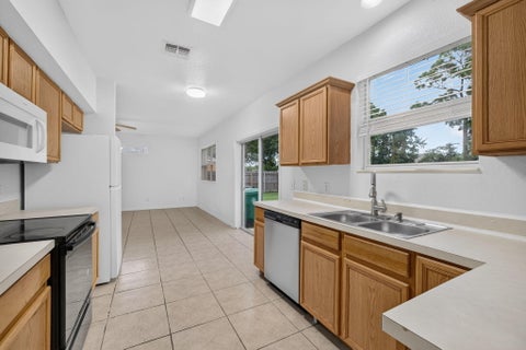 Tiny photo for 1965 SW BELLEVUE Avenue, Port Saint Lucie, FL 34953 (MLS # B26090473)