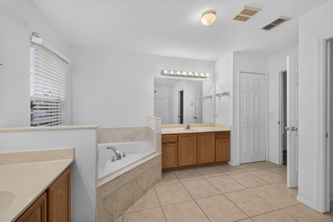 Tiny photo for 1965 SW BELLEVUE Avenue, Port Saint Lucie, FL 34953 (MLS # B26090473)