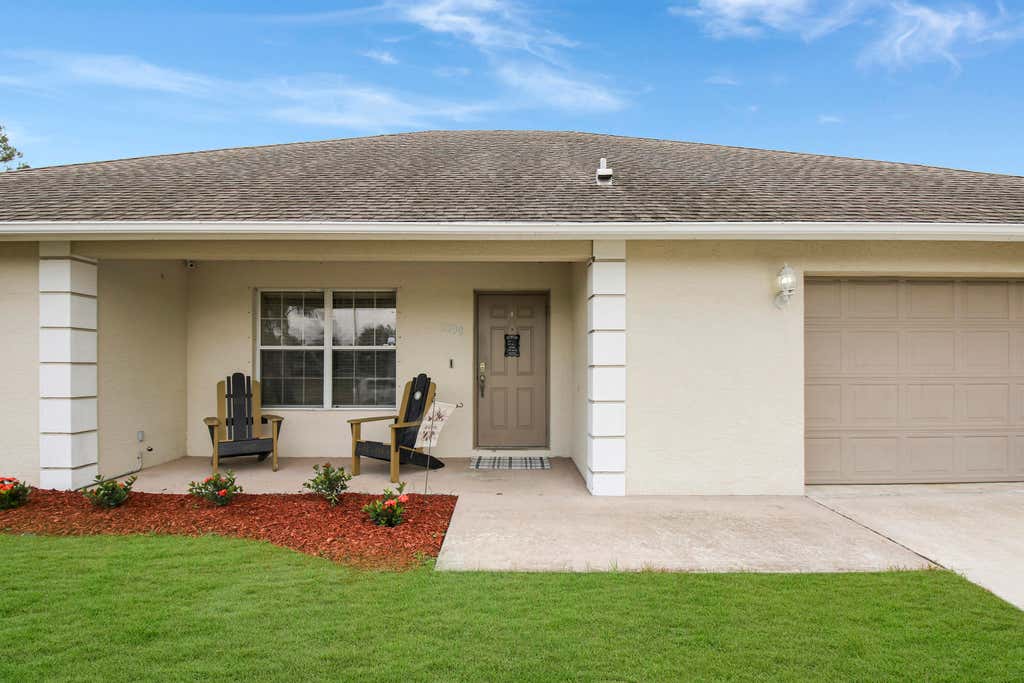 Photo of 3338 SW Esperanto Street, Port Saint Lucie, FL 34953 (MLS # R10959449)