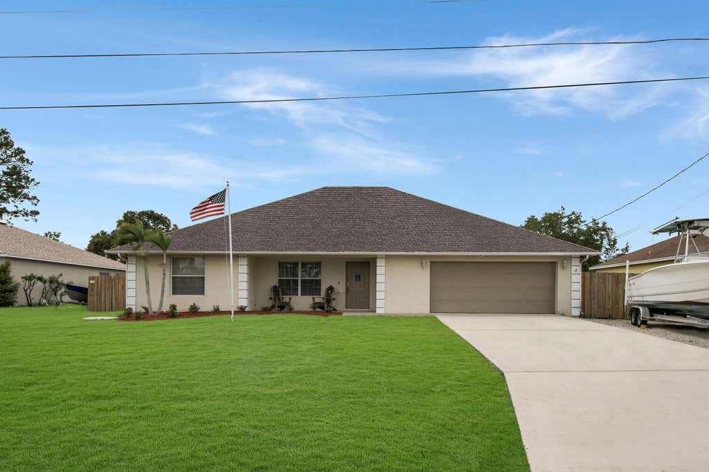 Photo of 3338 SW Esperanto Street, Port Saint Lucie, FL 34953 (MLS # R10959449)