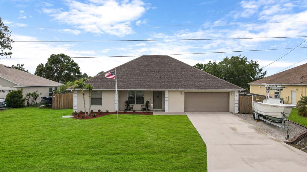 Photo of 3338 SW Esperanto Street, Port Saint Lucie, FL 34953 (MLS # R10959449)