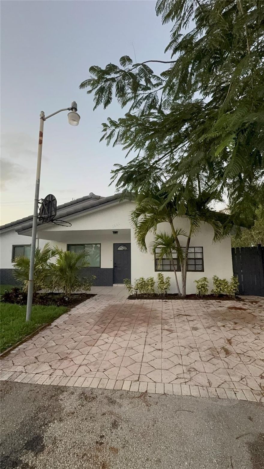 Welcome to this beautiful home located just across from the desirable Lighthouse Point. This 5 bed and 3 full bathrooms has undergone a massive renovation, and major upgrades provide peace of mind, making it move in ready for families or investors seeking comfort in a prime South Florida location. brand new flooring throughout, new ceilings, elegant high-hat lighting, brand new A/C system, tankless water heater, new roof, hurricane proof windows, New landscaping and lush, brand new grass, plenty of space for gatherings, pets, or a dream pool. Ideally situated just minutes from the beautiful beaches, close to major Highways including I-95 and Florida’s Turnpike. Easy access to shopping, dining, parks, and entertainment, as well as popular waterfront restaurants and attractions. No HOA fees Welcome to this beautiful home located just across from the desirable Lighthouse Point. This 5 bed and 3 full bathrooms has undergone a massive renovation, and major upgrades provide peace of mind, making it move in ready for families or investors seeking comfort in a prime South Florida location. brand new flooring throughout, new ceilings, elegant high-hat lighting, brand new A/C system, tankless water heater, new roof, hurricane proof windows, New landscaping and lush, brand new grass, plenty of space for gatherings, pets, or a dream pool. Ideally situated just minutes from the beautiful beaches, close to major Highways including I-95 and Florida’s Turnpike. Easy access to shopping, dining, parks, and entertainment, as well as popular waterfront restaurants and attractions. No HOA fees