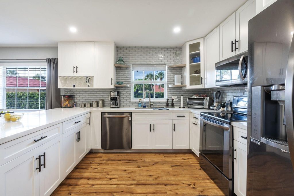Photo of 1452 SW 26th Avenue #E, Boynton Beach, FL 33426 (MLS # R11005434)
