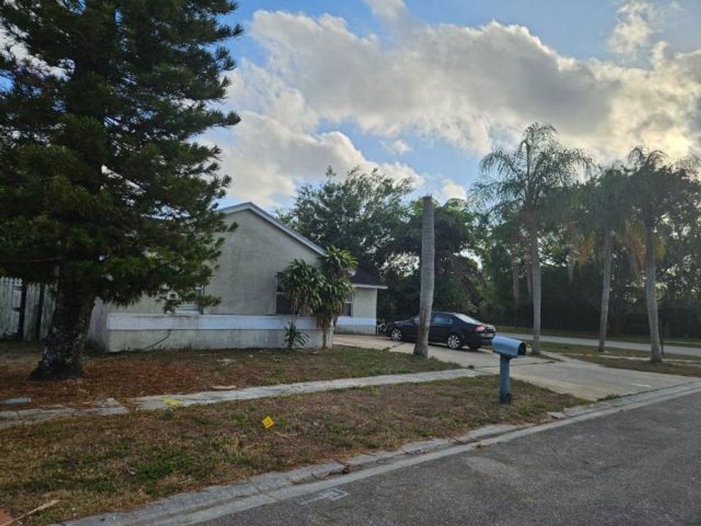Photo of 5454 River Plantation Road, Lake Worth Beach, FL 33463 (MLS # R11167077)
