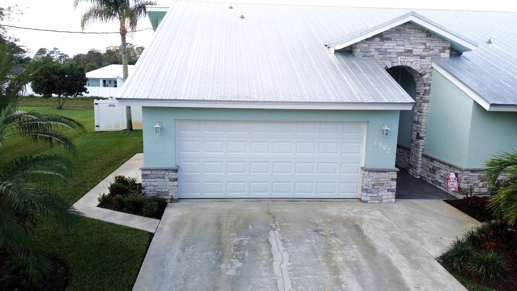 Photo of 1992 SW Aaron Lane, Port Saint Lucie, FL 34953 (MLS # R10954062)