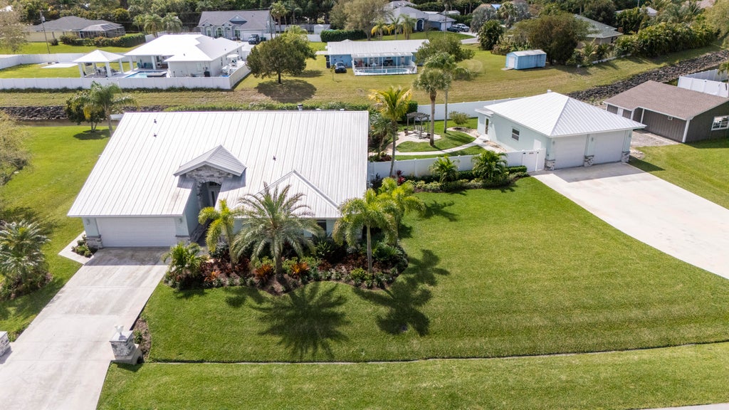 Photo of 1992 SW Aaron Lane, Port Saint Lucie, FL 34953 (MLS # R10954062)