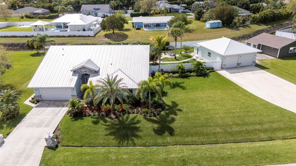 Photo of 1992 SW Aaron Lane, Port Saint Lucie, FL 34953 (MLS # R10954062)