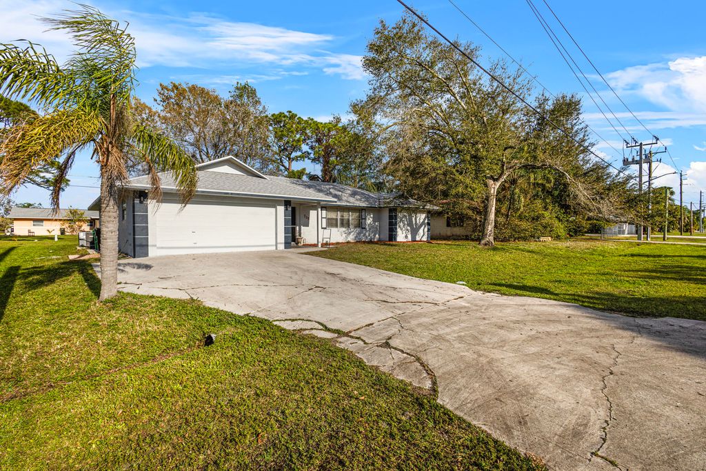 Photo of 735 SE Floresta Drive, Port Saint Lucie, FL 34983 (MLS # R11058029)