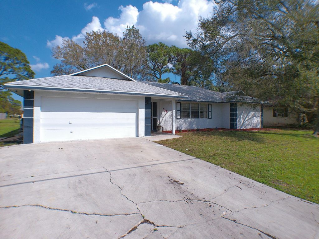 Photo of 735 SE Floresta Drive, Port Saint Lucie, FL 34983 (MLS # R11058029)