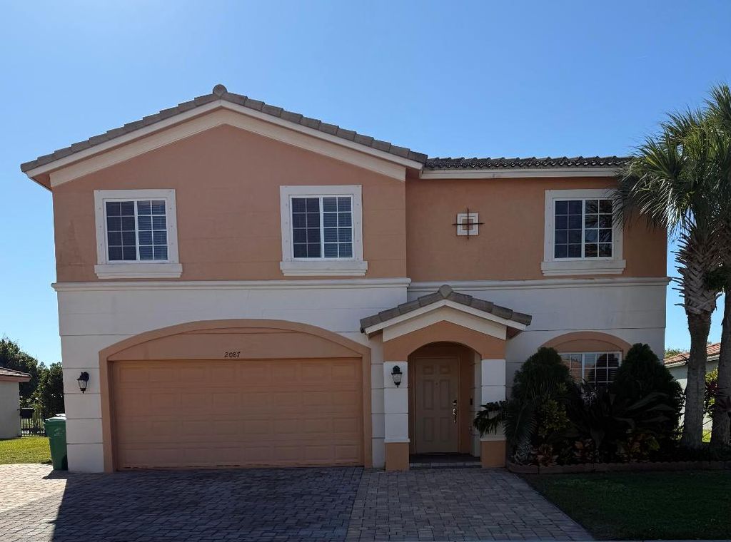 Photo of 2087 SW Newport Isles Boulevard, Port Saint Lucie, FL 34953 (MLS # R11151127)