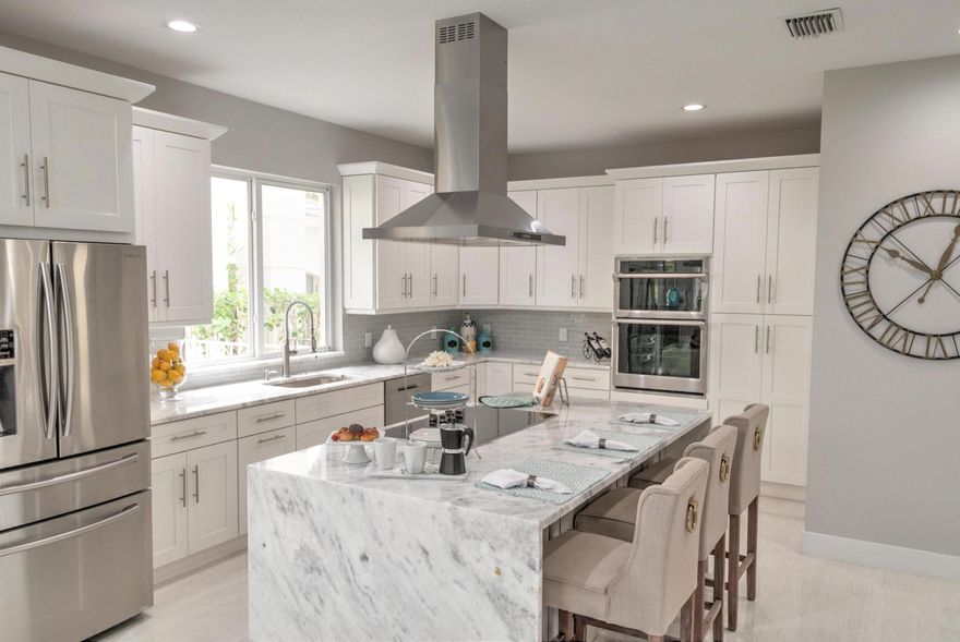 If you like Brand New, If you want to be the first to live in a home, if you like knowing that you are the first to use something, then this house is for you. Be the first to live in this totally renovated home.  This home features stunning porcelain plank floors, designer kitchen with all new stainless steel appliances, new all wood shaker style cabinets with soft closing doors/drawers, waterfall granite countertops, and built in pantry.
New Broten Impact resistant garage door, New Impact front door, New Impact windows and skylights which qualifies home for insurance reduction.  New master bath and guest baths. New hardwood flooring and staircase railings. Many many more features.  Only home like it in Polo Club.