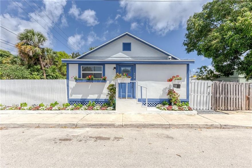 Ready to move in, this charming downtown Lake Worth Beach cottage has been nicely updated.  The 2 bedroom 2 bathroom home features an open floor plan. The kitchen has all new cabinets, butcher block counter tops, stainless appliances & a washer/dryer combo. If you work from home, there is a sunny den in the front. Located about 2 blocks from the restaurants, shops and bars in Downtown LWB. The new updates include roof, hurricane impact windows, new doors, new flooring, fresh interior/exterior paint, programable thermostat, new lighting and fans, new AC, new electric panel, new primary bathroom,  new toilet vanity, mirror, glass door and shelves in 2nd bathroom. The large backyard with she shed has off street parking and room for a pool.  There is a stand up attic.