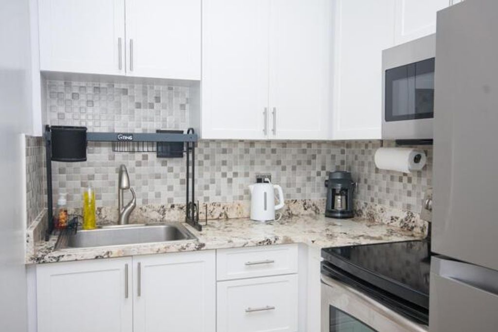 Photo of 301 Croton Avenue #303, Lantana, FL 33462 (MLS # R11087631)