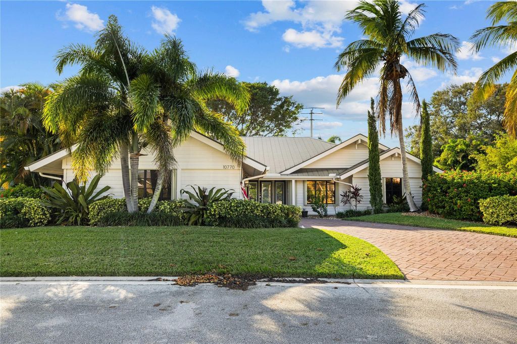 Photo of 10770 SE Jupiter Narrows Drive, Hobe Sound, FL 33455 (MLS # F10416085)