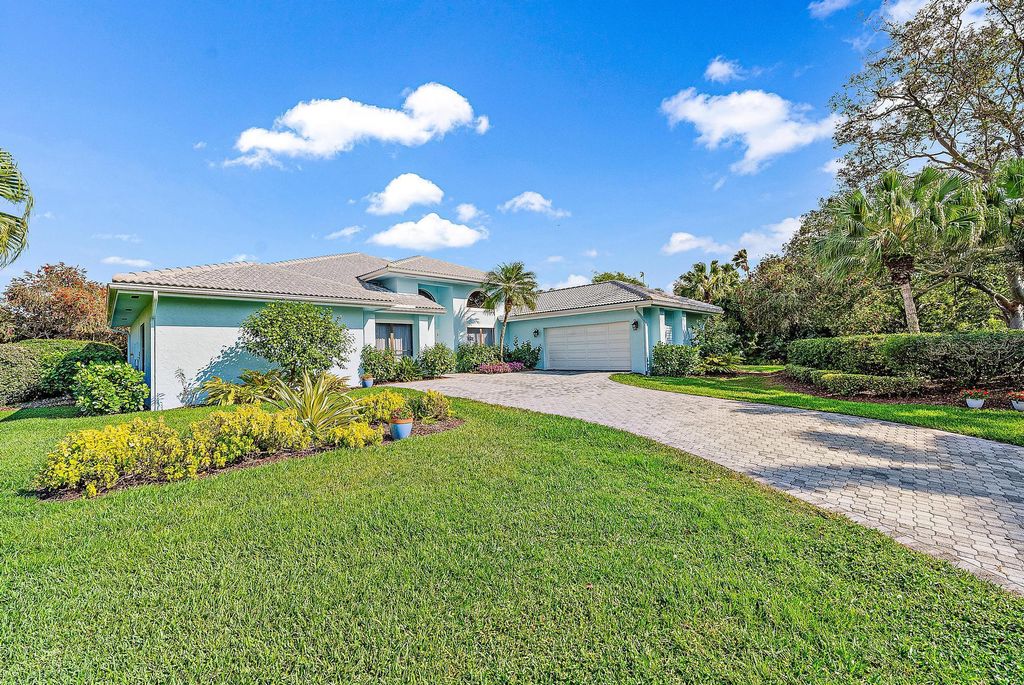 Photo of 4034 SW Gleneagle Circle, Palm City, FL 34990 (MLS # R10970829)