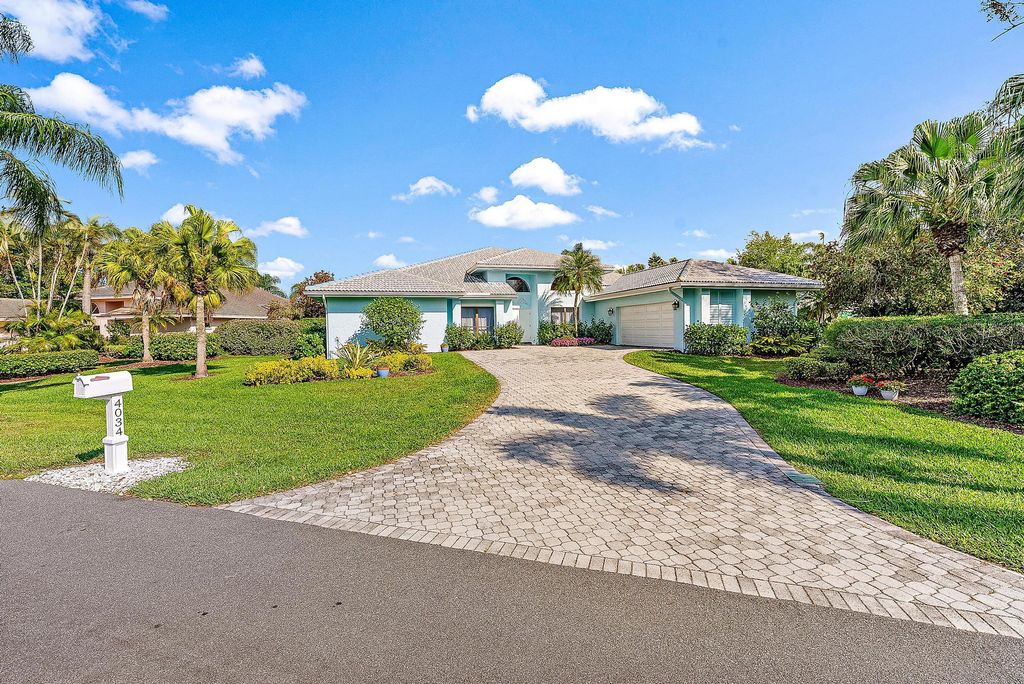 Photo of 4034 SW Gleneagle Circle, Palm City, FL 34990 (MLS # R10970829)